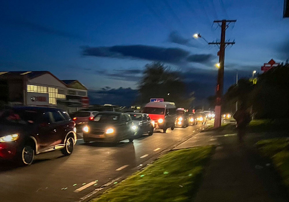 Cars on road during daytime by Ethan Hooson